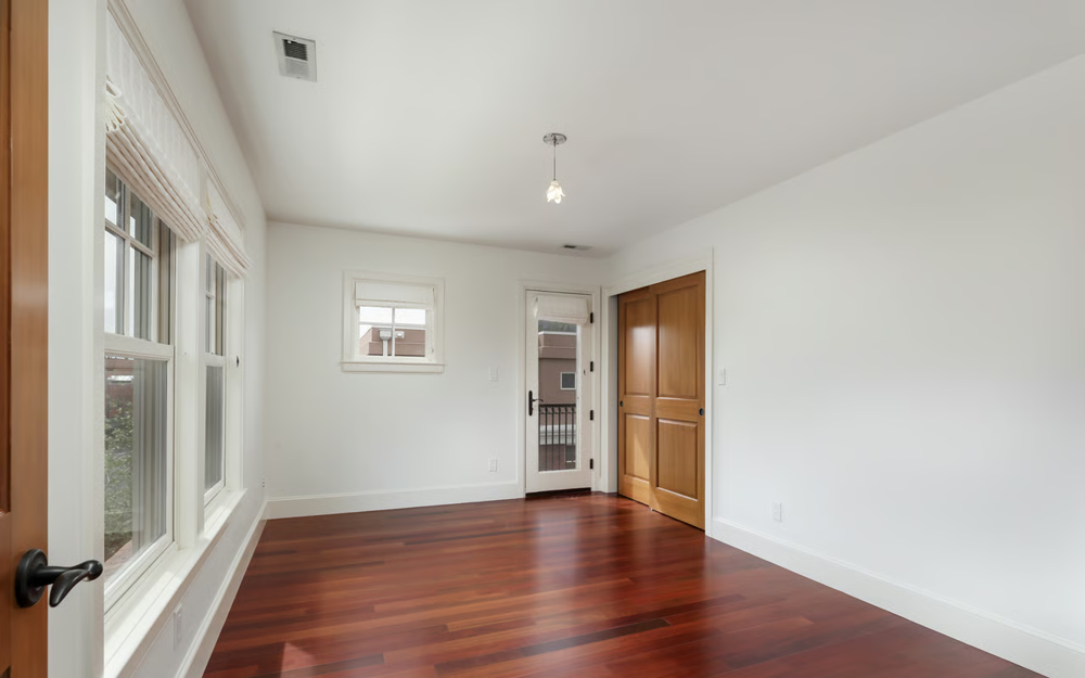 Bedroom with hardwood floors